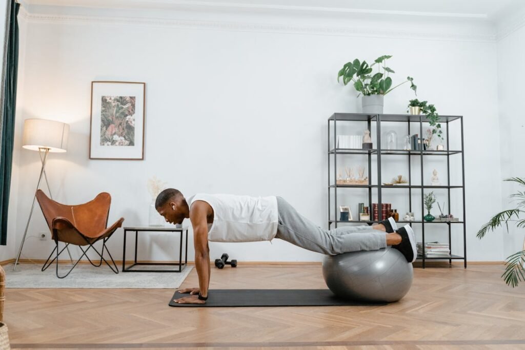 Balance ball: man balancing on bal 