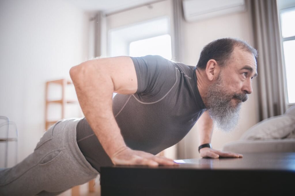 18:6 intermittent fasting: man doing pushups 