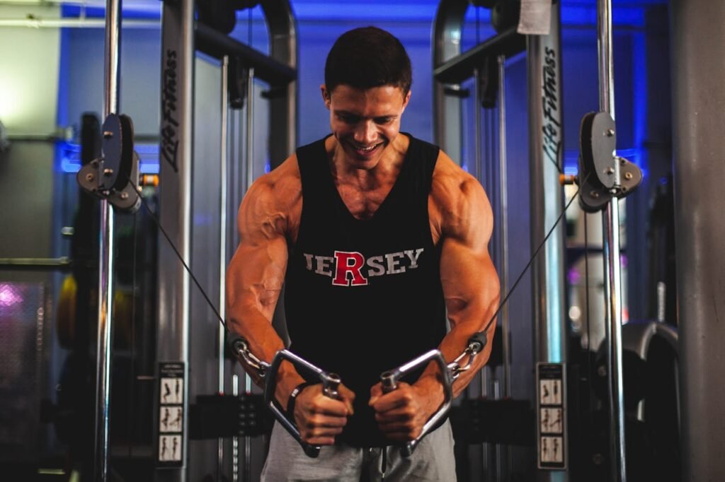 Functional trainers: man using machine 